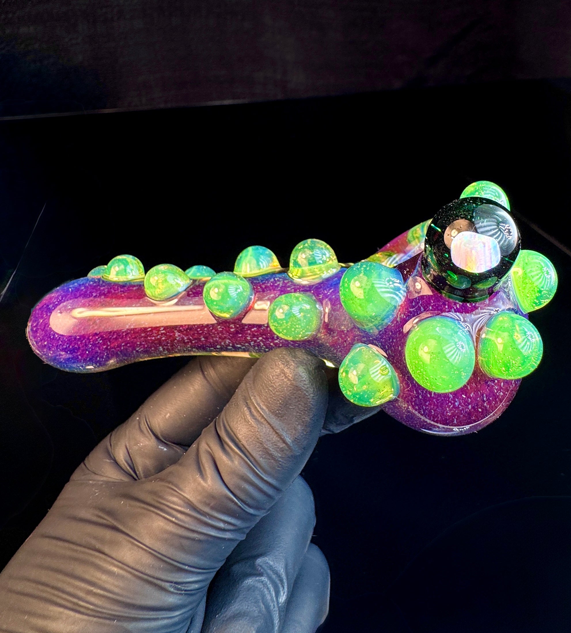 Magenta glass pipe with slyme green dots and an opal.