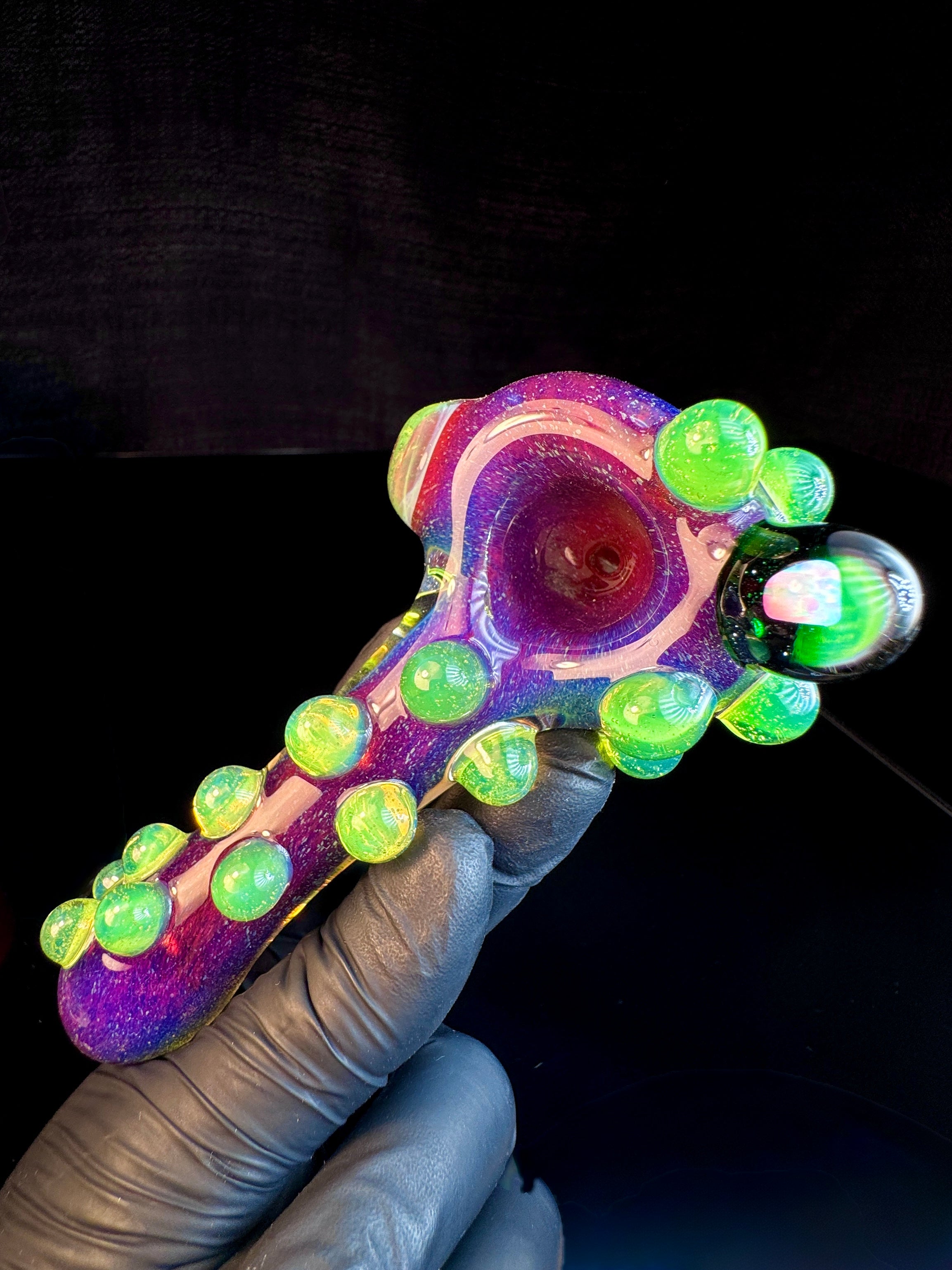 Magenta glass pipe with slyme green dots and an opal.