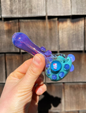 An Amber Purple Pipe with Opaque Aqua and Pink Slyme Dots