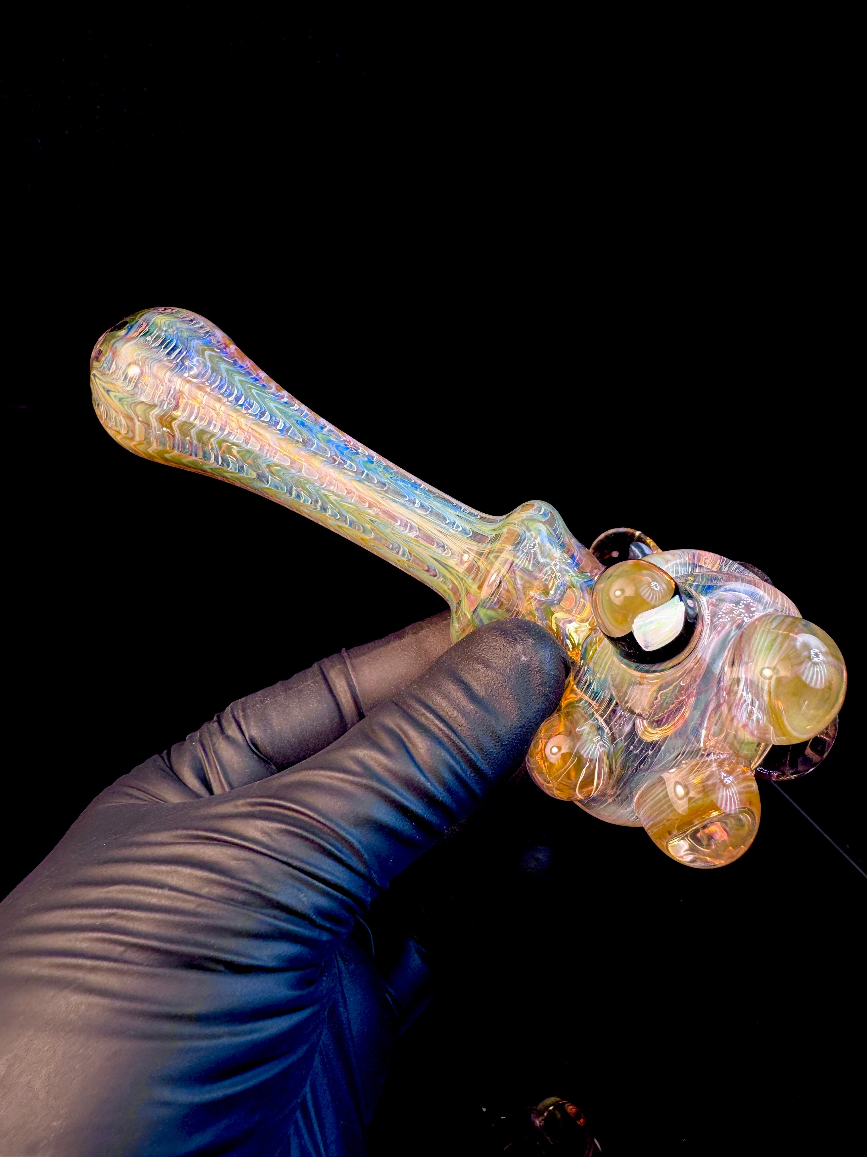 Golden dark web opal spoon