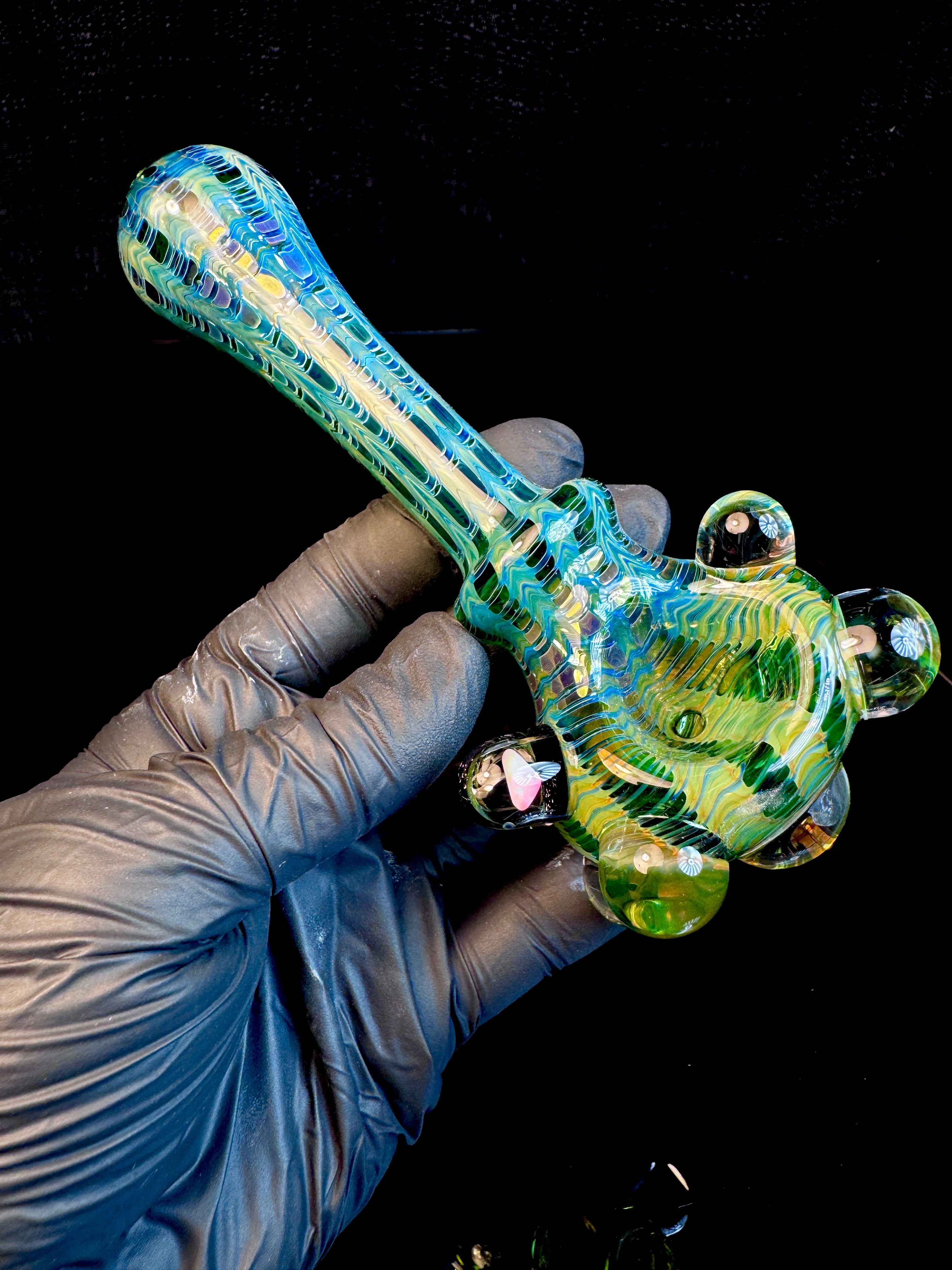 Emerald green dark web opal pipe