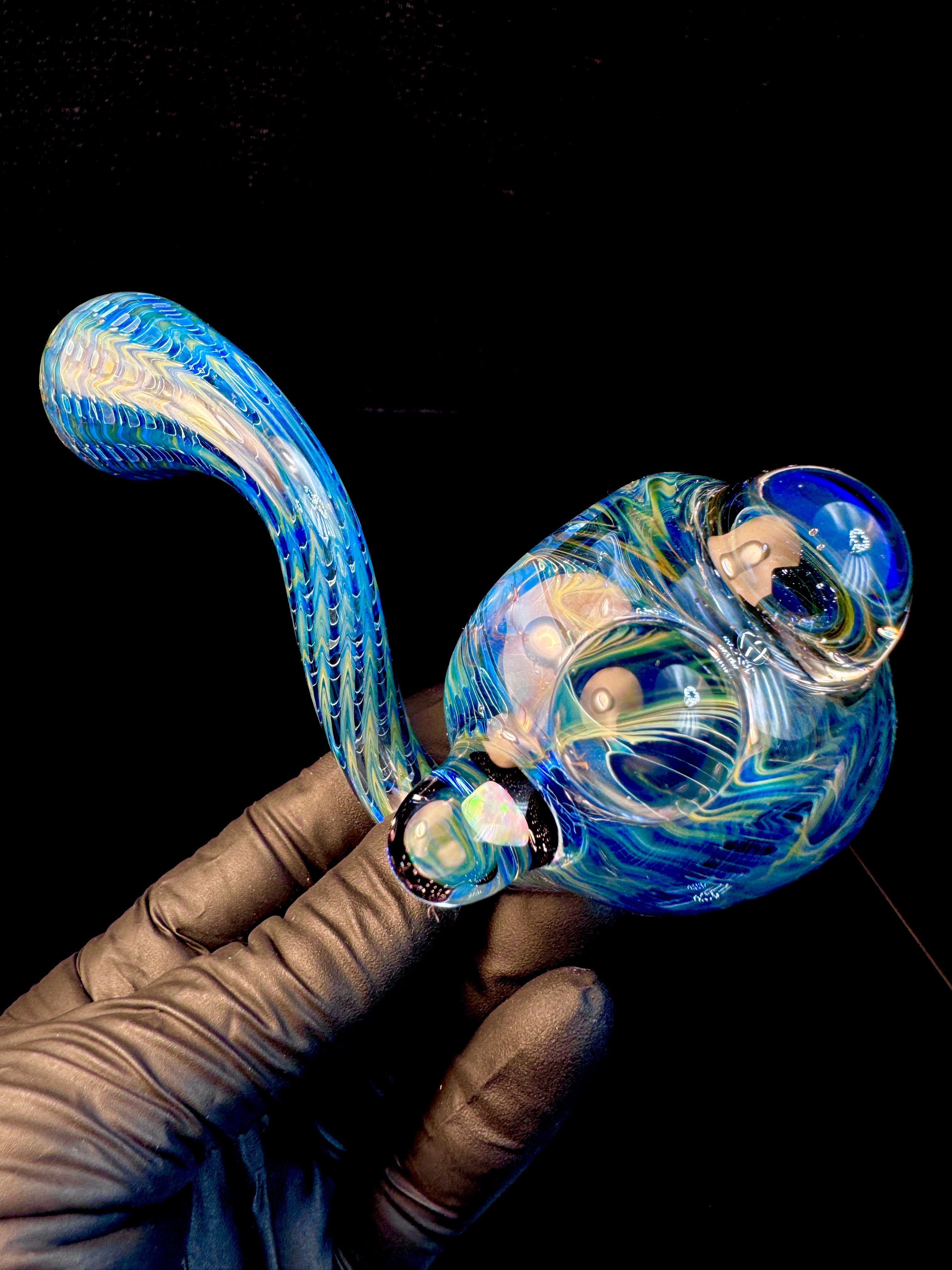 Vibrant blue dark web opal bendy